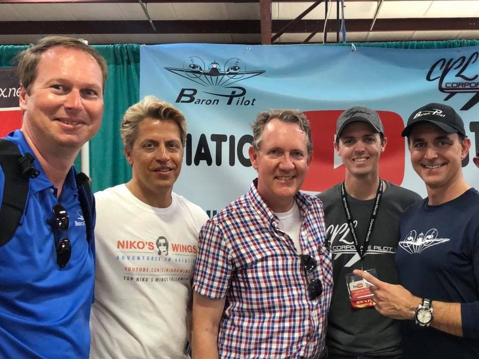Daniel with a group of aviation YouTubers at an event.
